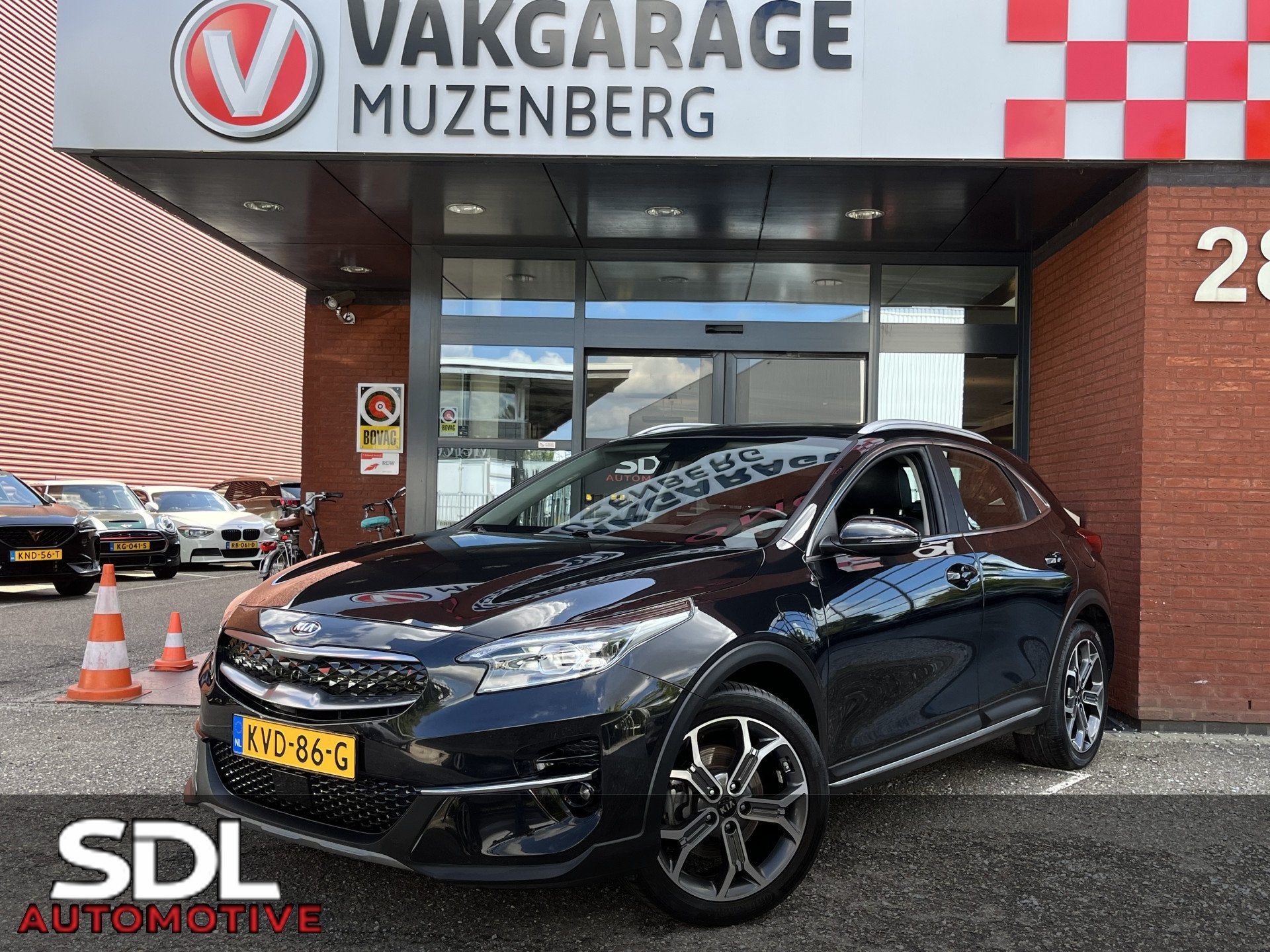 Kia Xceed 1.6 GDi PHEV DynamicPlusLine // SOH 100% // KEYLES, Auto's, Gebruikt, Zwart, Leder en Stof, Zwart