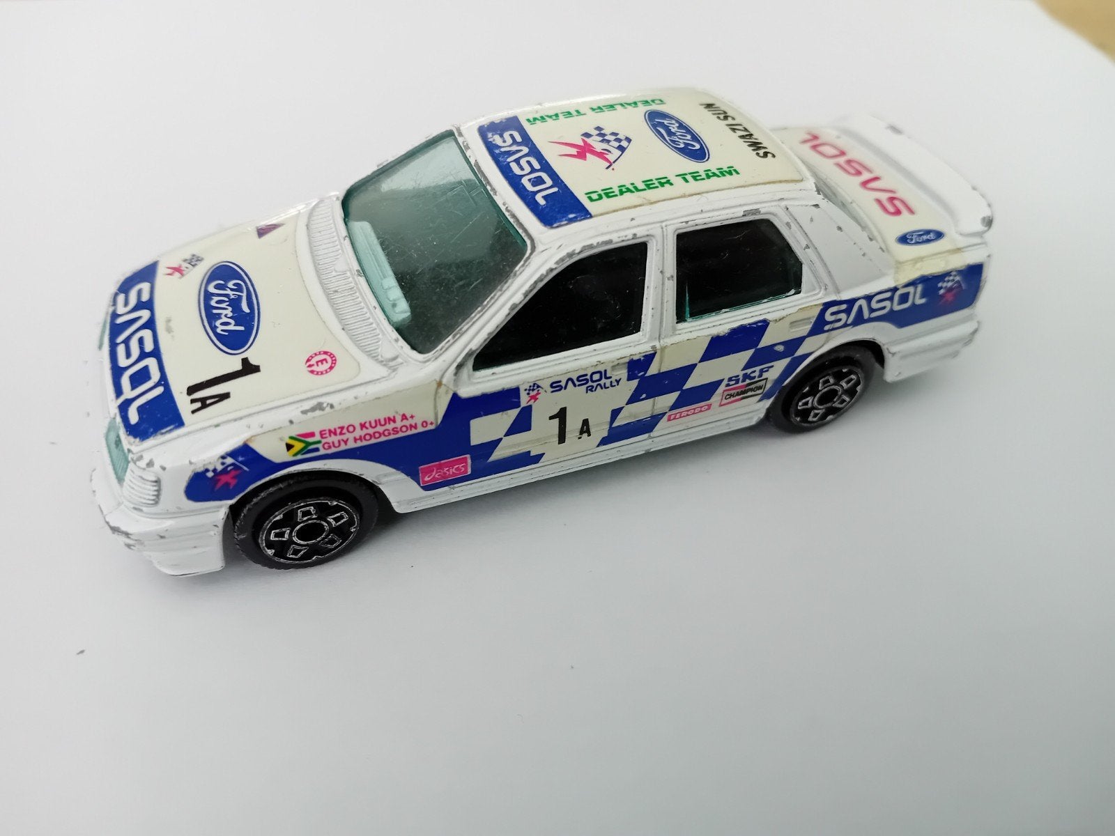 Burago Ford Sierra  1/43, Ophalen of Verzenden, Gebruikt, Auto
