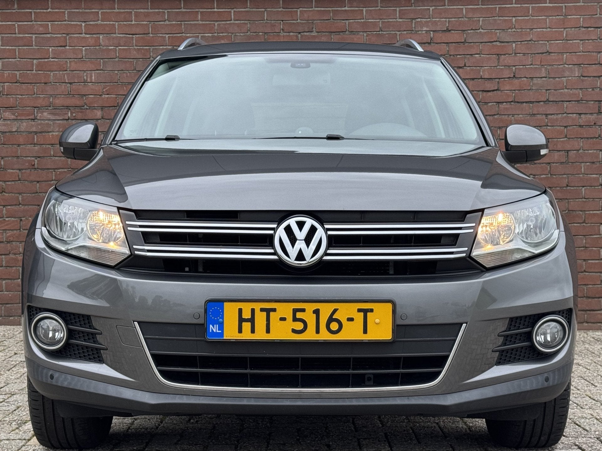 Volkswagen Tiguan 1.4 TSI SPORT&STYLE | NL-AUTO! | DEALER OH, Auto's, Voorwielaandrijving, Euro 5, 15 km/l, Gebruikt