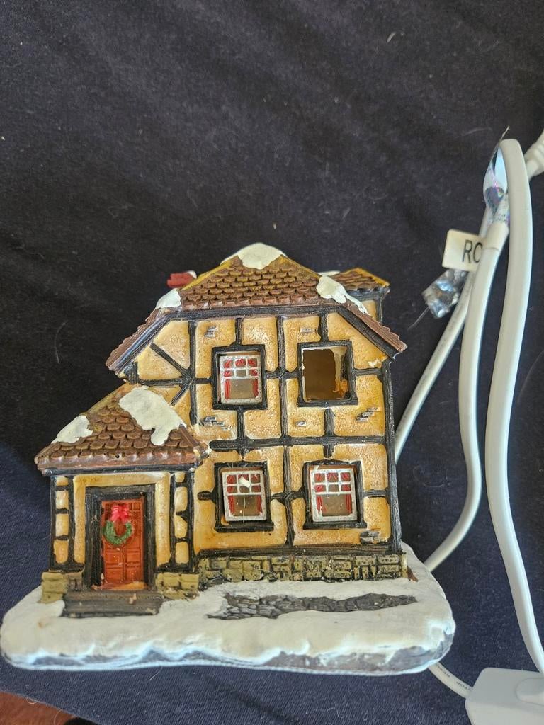Kersthuisje met verlichting, Ophalen