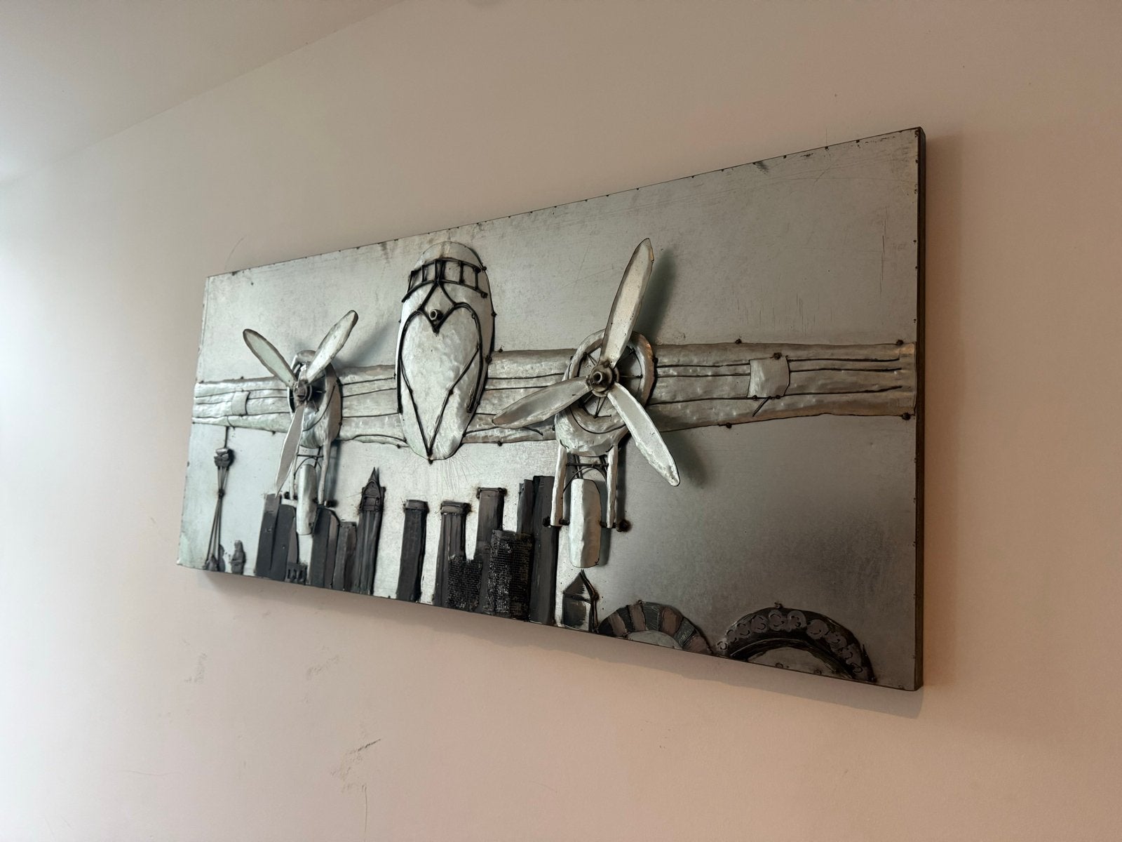 Metalen wanddecoratie vliegtuig met skyline, Ophalen of Verzenden