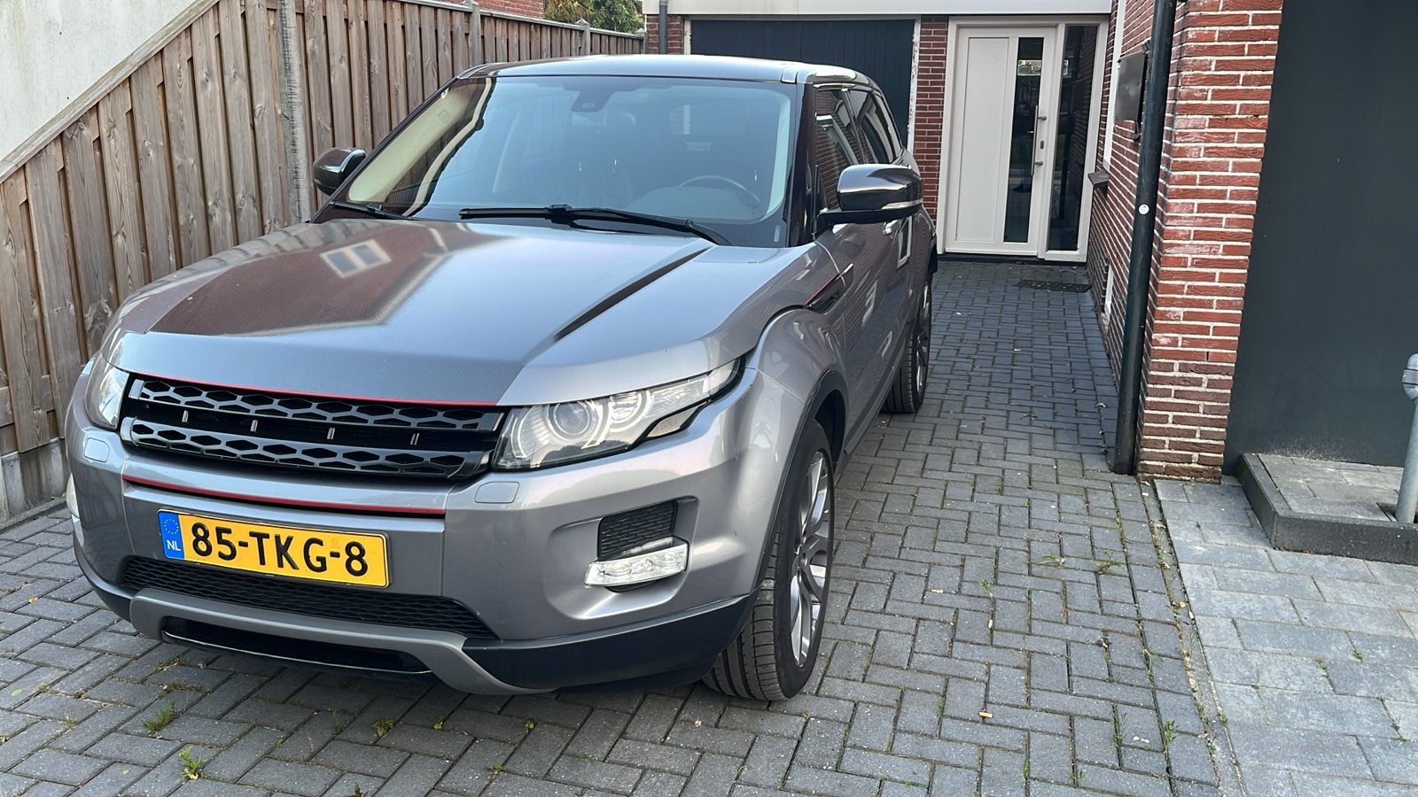 Land Rover Range Rover Evoque 2.2 TD4 4WD AUT 2012 Grijs, Auto's, Automaat, 15 km/l, 1800 kg, 1650 kg