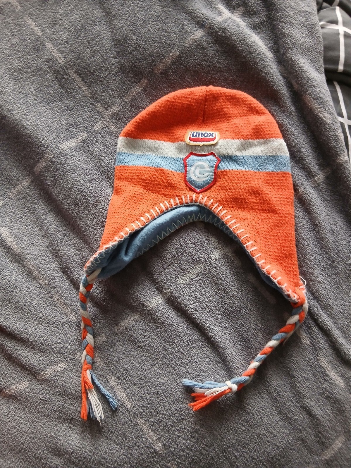 Unox Muts - Oranje met Blauw/Wit Strepen  zie omschrijving, Ophalen of Verzenden, Zo goed als nieuw, Gebruiksvoorwerp