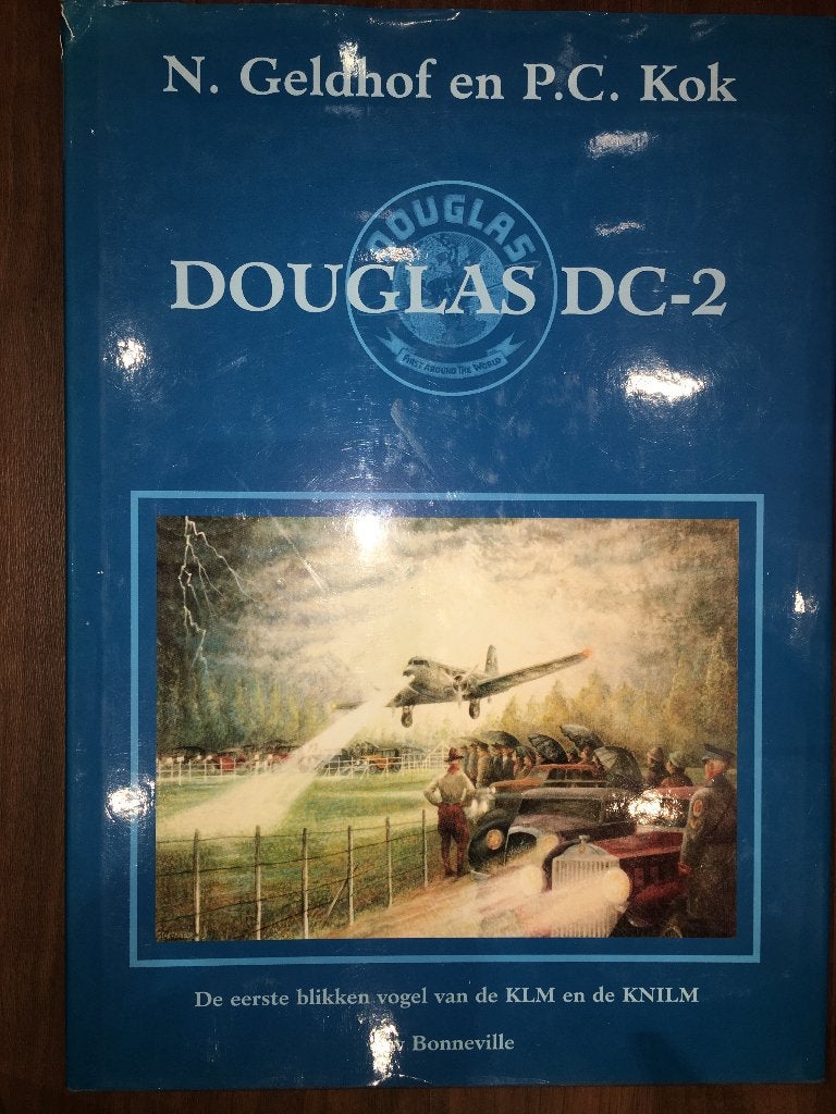 Douglas DC-2 N. Geldhof P.C. Kok - zilveren vogel KLM KNILM, Ophalen of Verzenden, Zo goed als nieuw, Boek of Tijdschrift