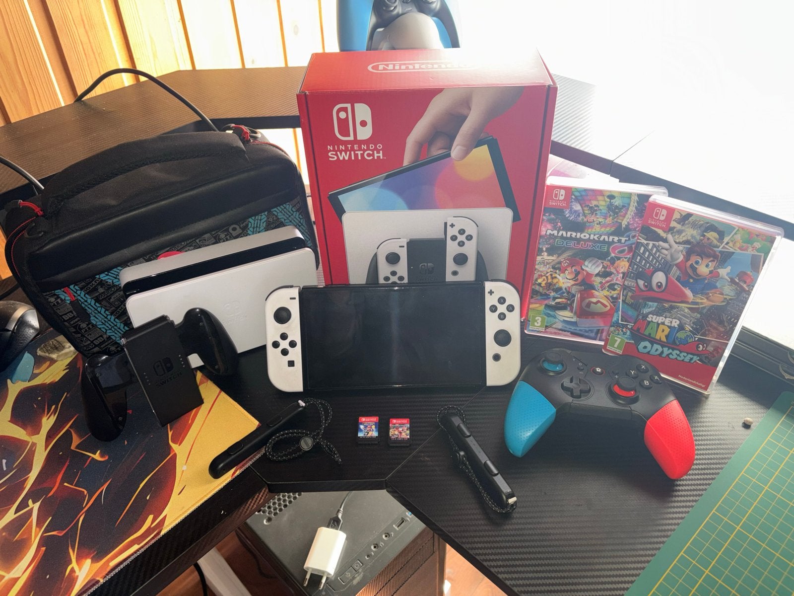 Nintendo Switch OLED met games en extra controller