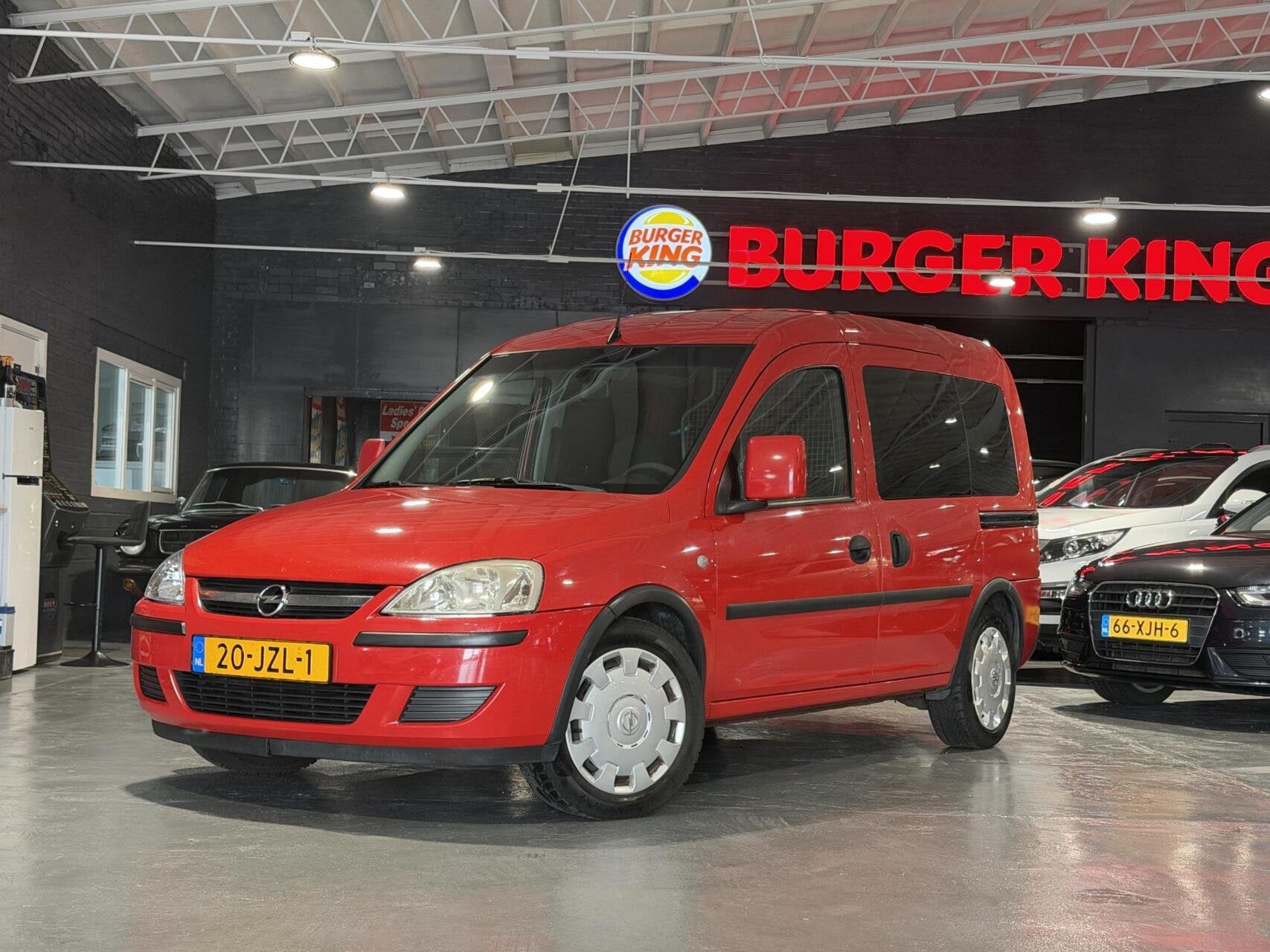 Opel Tour 1.4-16V Enjoy Airco Benzine achterbank, Auto's, Voorwielaandrijving, Gebruikt, Overige modellen, 4 cilinders