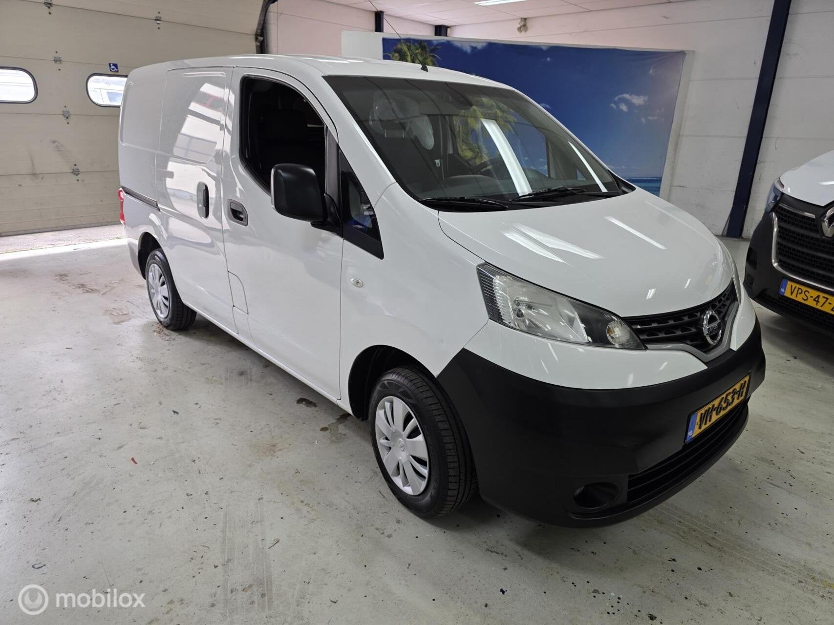 Nissan NV200 1.5 dCi Airco Cruise Camera Navi, Auto's, Euro 5, Gebruikt, 4 cilinders, Wit