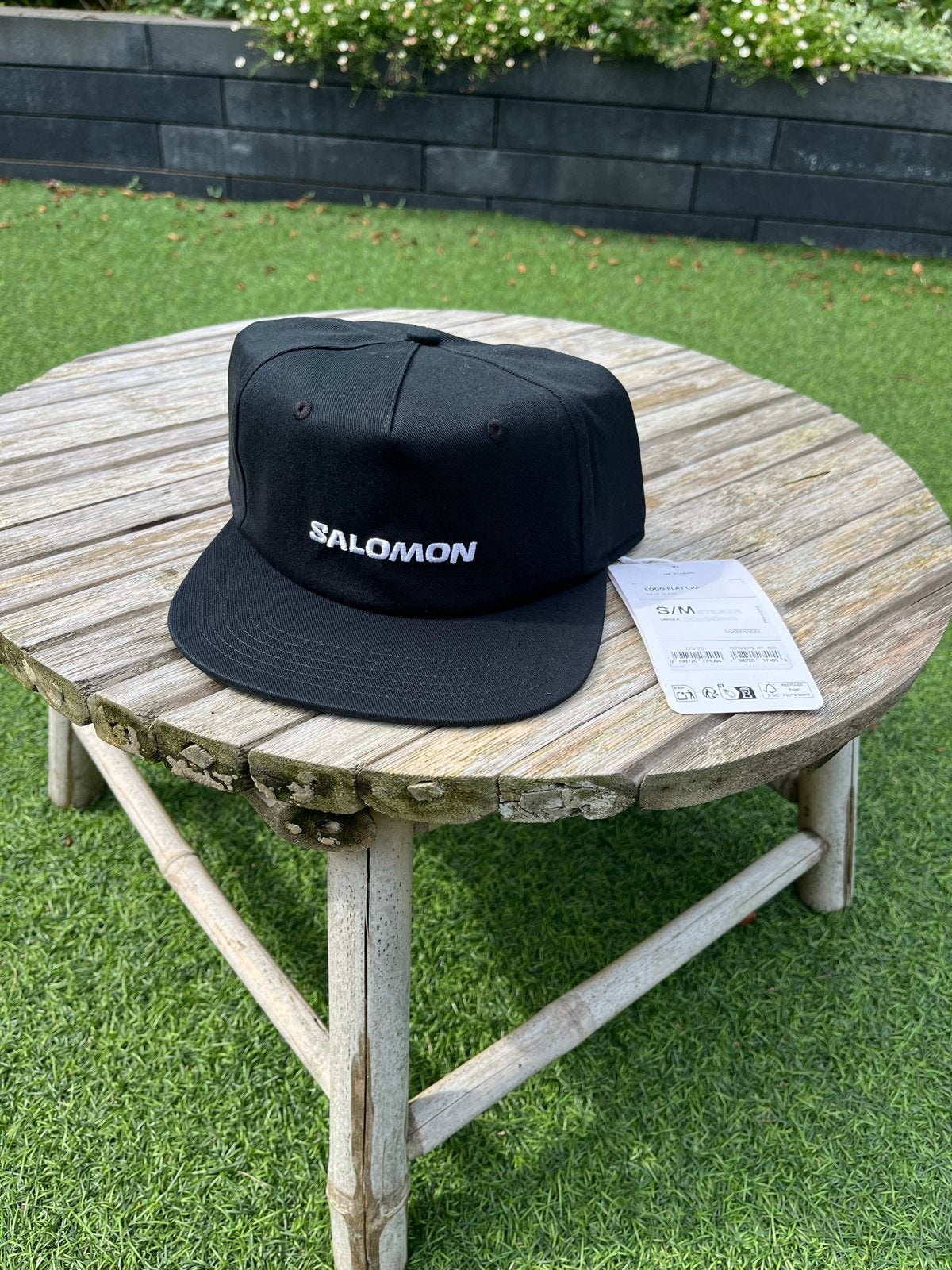 Salomon logo flat cap Zwart S/M - Nieuw met label, Ophalen of Verzenden, Nieuw, Pet