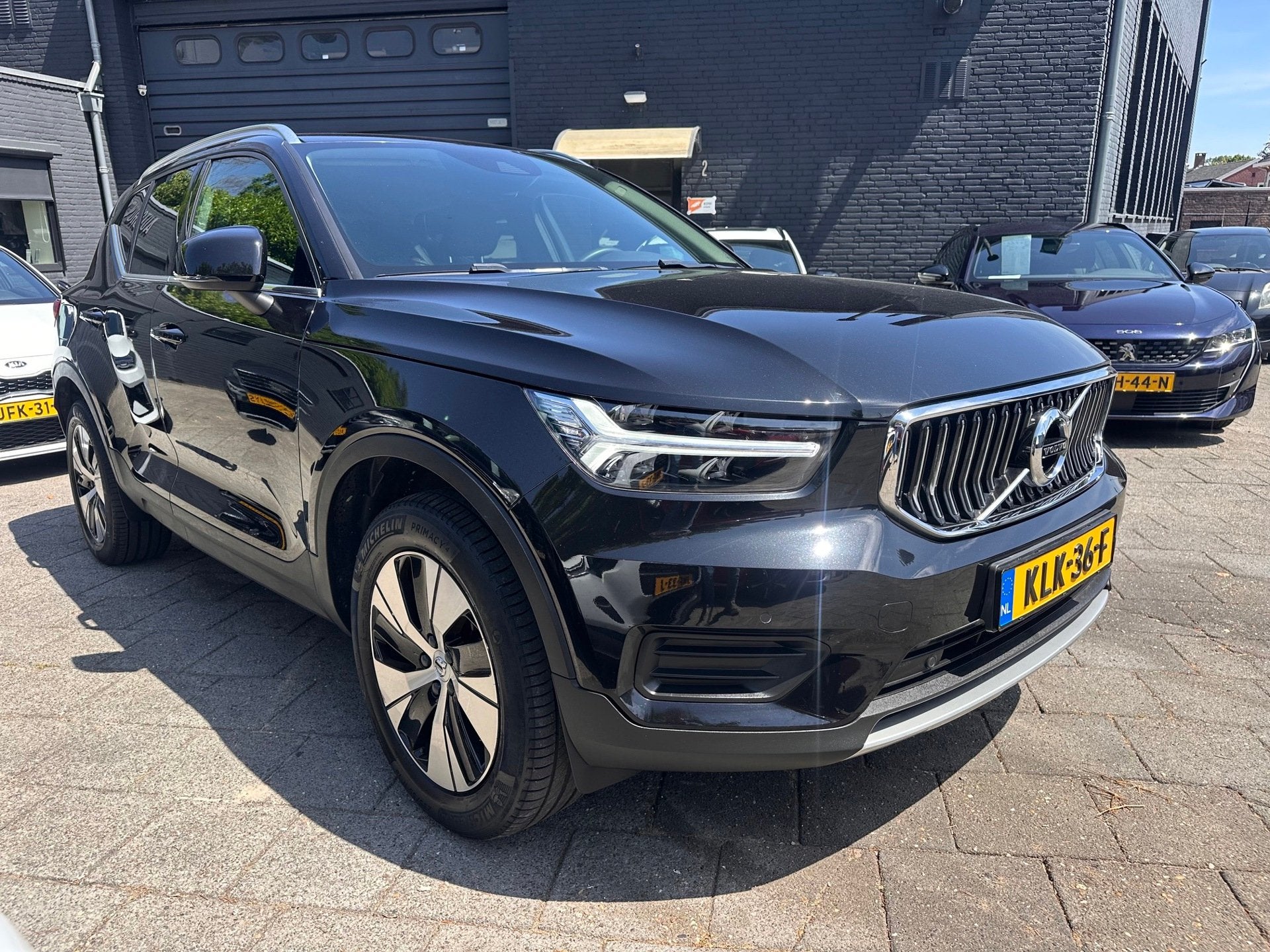 Volvo XC40 1.5 T5 Recharge|262pk|Camera|Carplay, Auto's, Parkeersensor, Stof, Gebruikt, Zwart