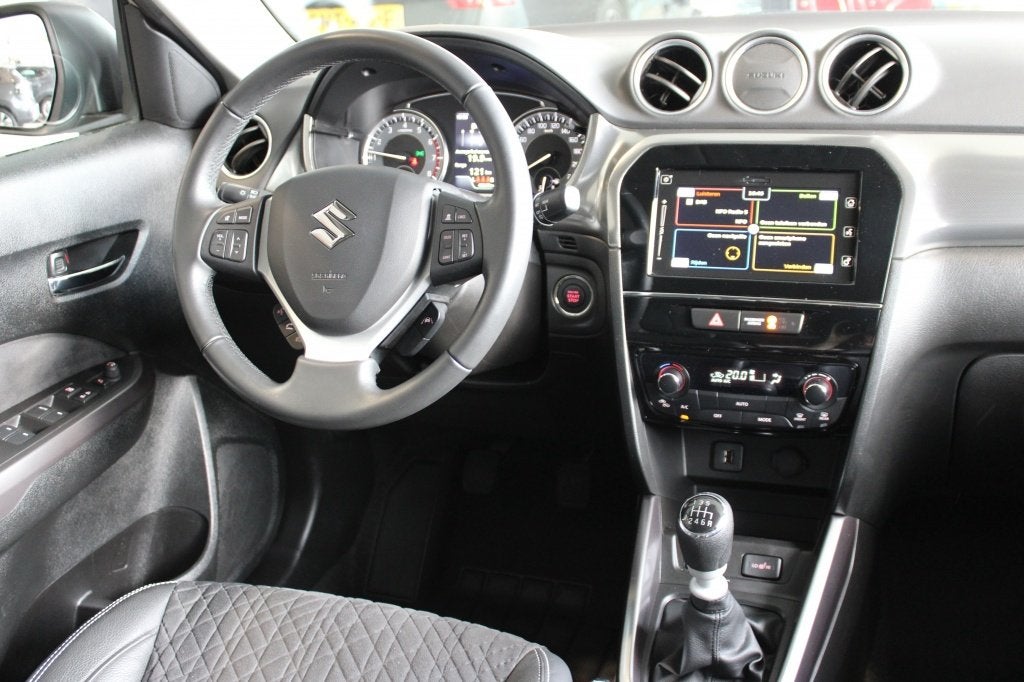 Suzuki Vitara 1.4 Boosterjet Style Smart Hybrid | Half Leder, Stof, Gebruikt, 4 cilinders, 49 €/maand