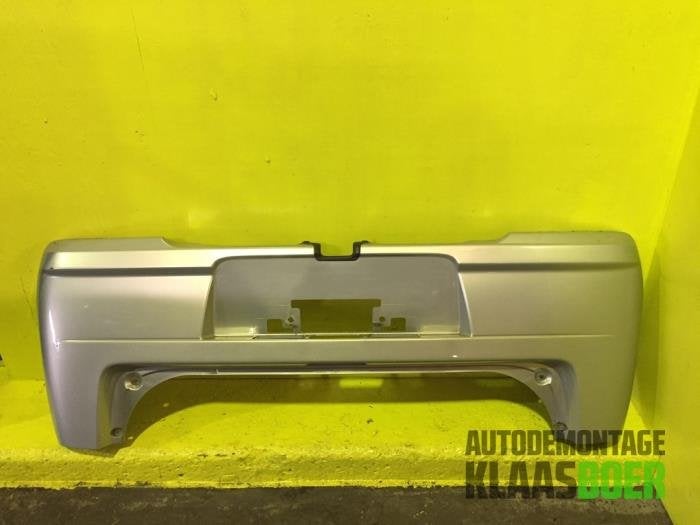Achterbumper van een Daihatsu Cuore, Auto-onderdelen, Carrosserie en Plaatwerk, Gebruikt, Daihatsu, -, -