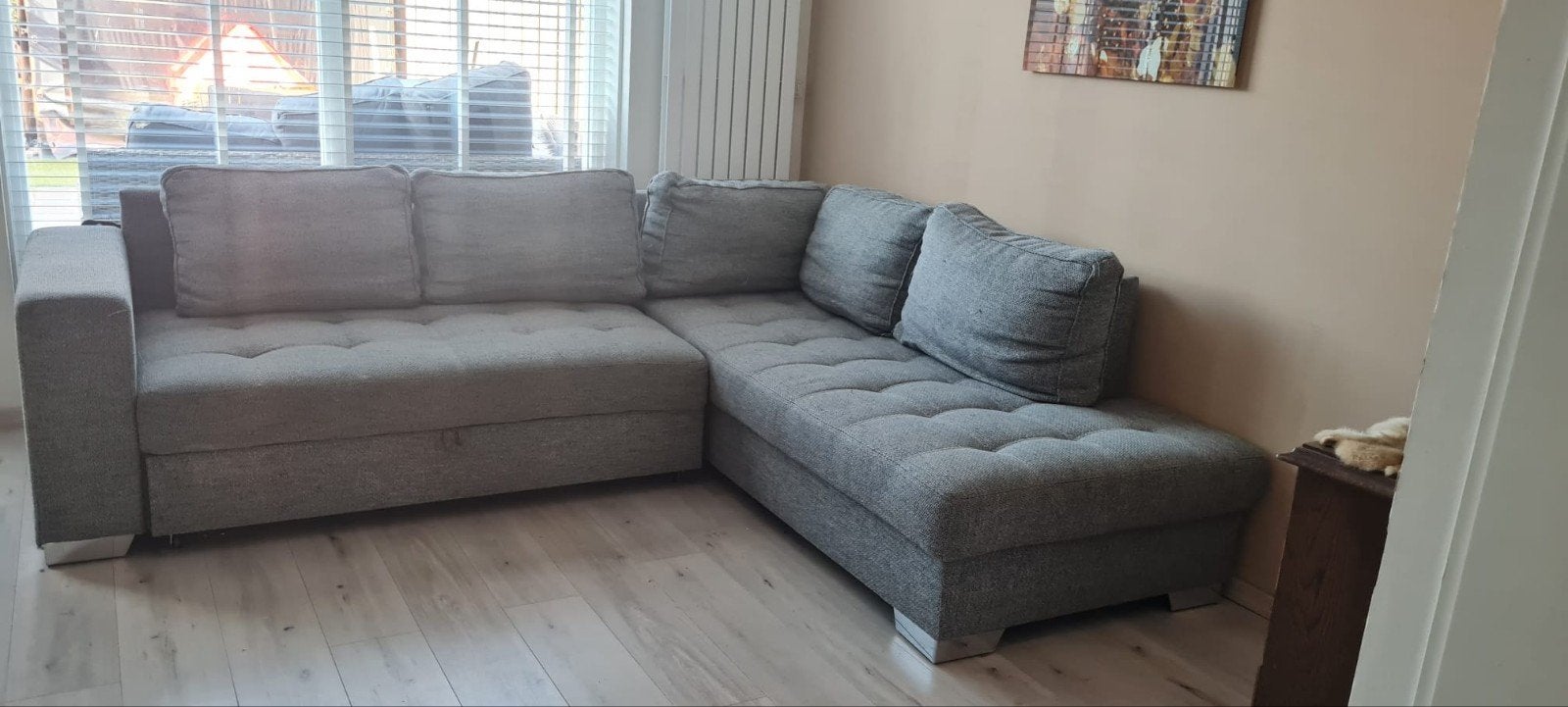 Moet nu weg: Comfortabele hoek/slaapbank in goede staat, Ophalen, Grijs