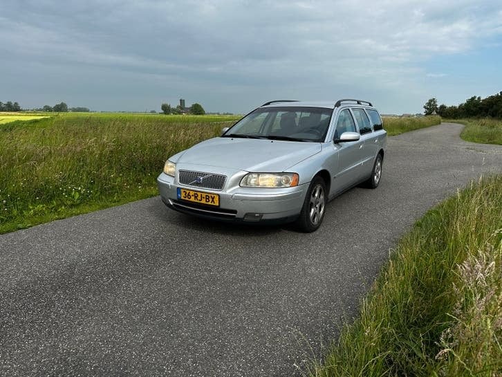 Volvo V70 2.4 140PK 2004 Grijs LPG, Auto's, Volvo, Voorwielaandrijving, 1800 kg, Stationwagon, Particulier