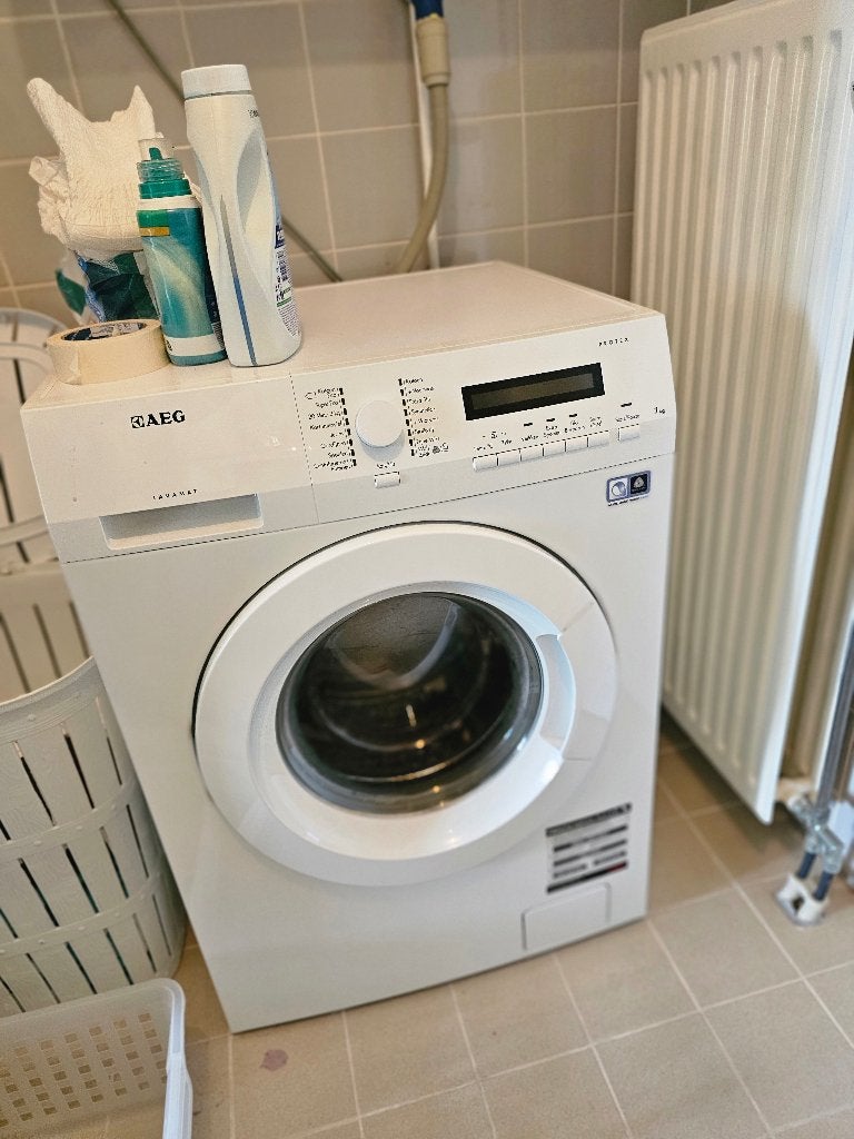 Wasmachine AEG, Ophalen, Zo goed als nieuw, 85 tot 90 cm, Energieklasse A of zuiniger