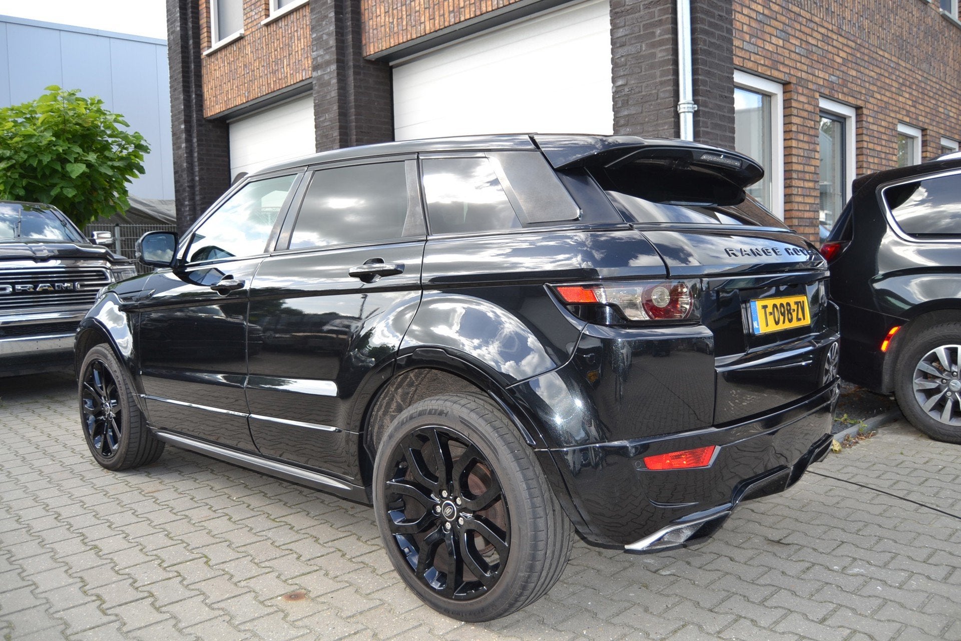 Land Rover Range Rover Evoque 2.0 Si 4WD Prestige, Auto's, Automaat, Euro 5, Zwart, 4 cilinders