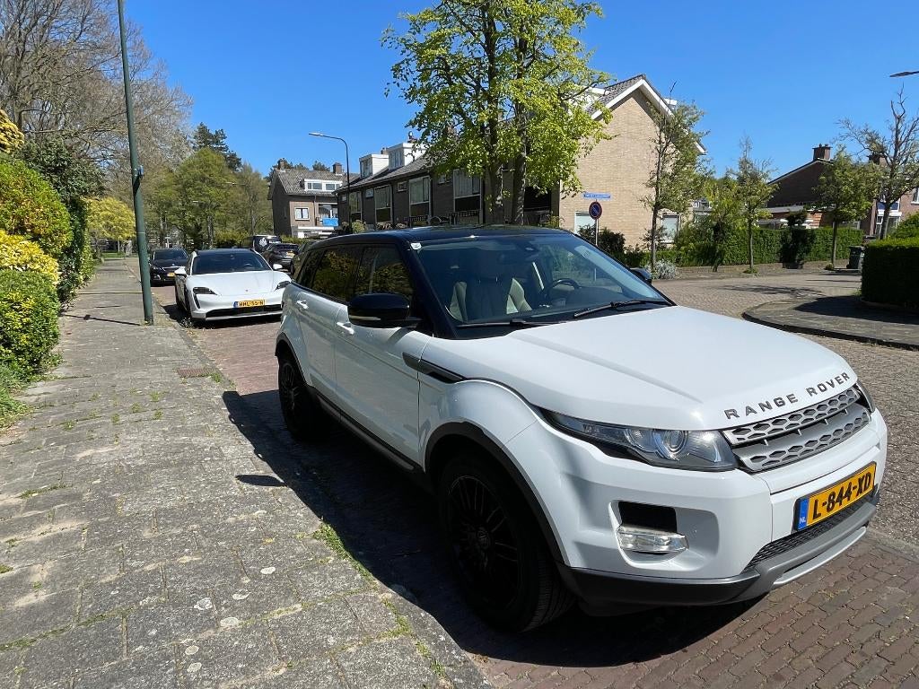 Land Rover Range Rover Evoque SI4 4WD AUT 2011 Wit, Benzine, Auto's, Automaat, 1800 kg, Stoelverwarming, 4 cilinders