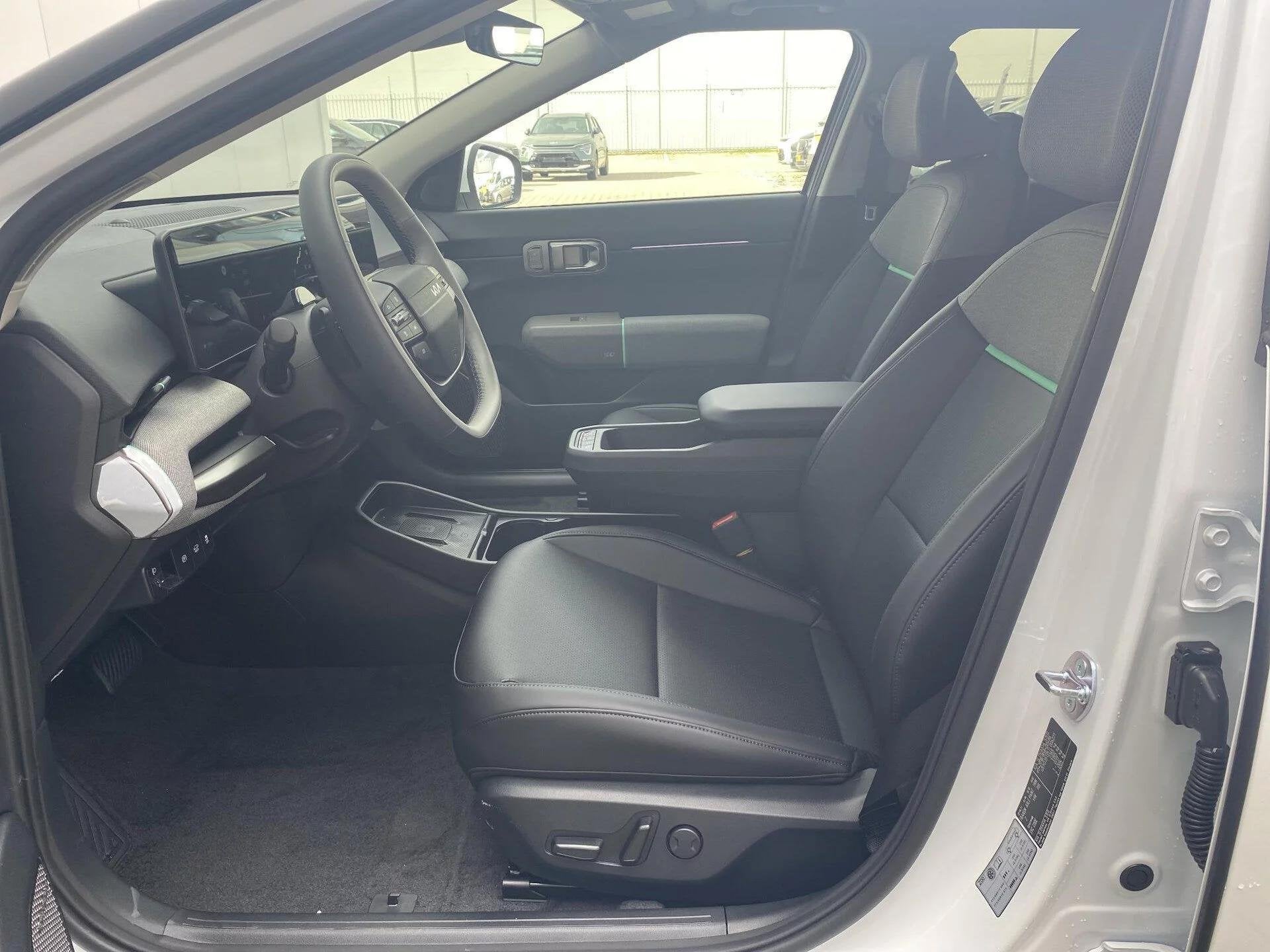 Kia EV4 Plus Advanced 58.3 kWh Nieuw uit voorraad leverbaar,, Auto's, Stof, Nieuw, 204 pk, 58 kWh
