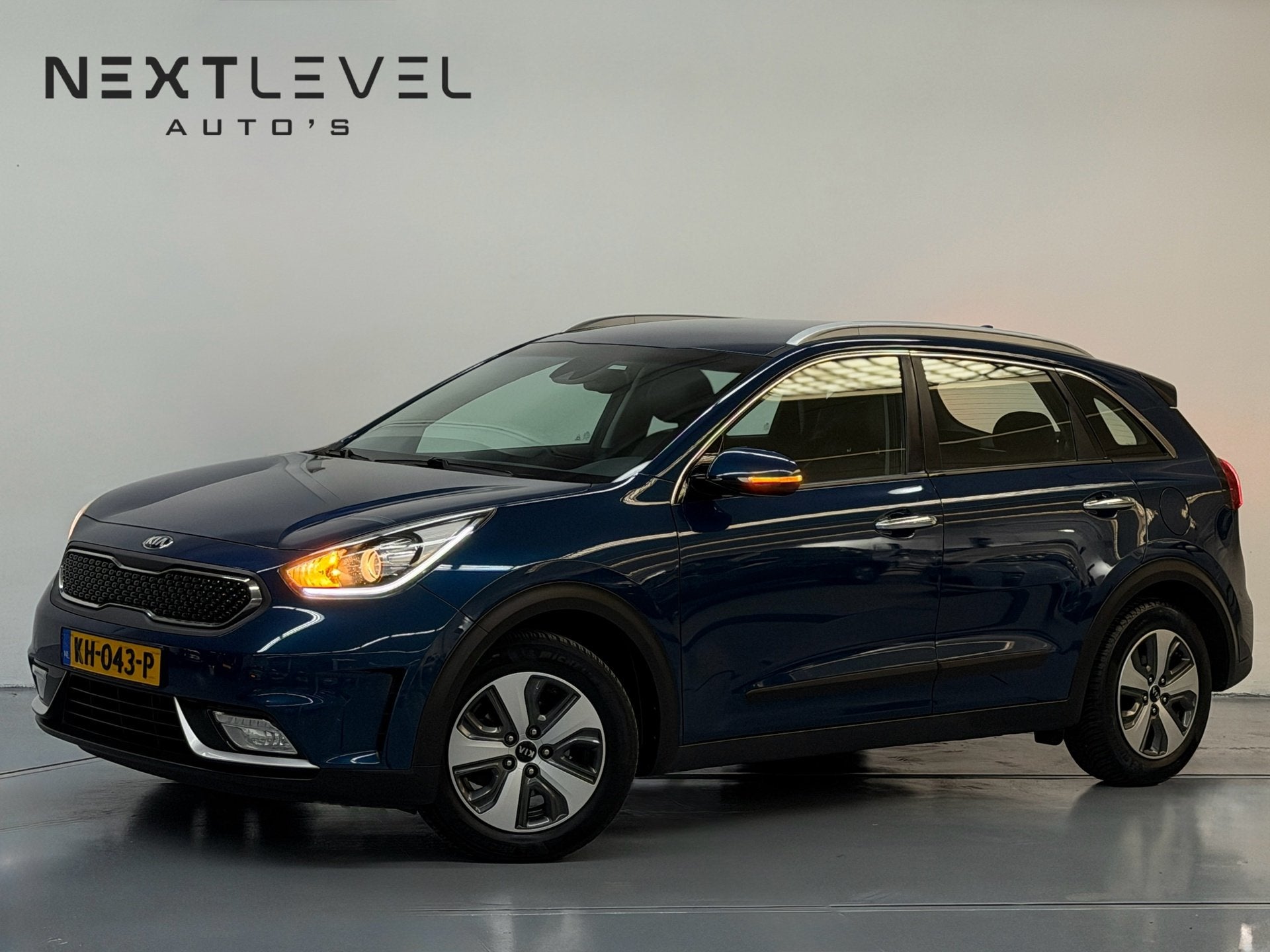 Kia Niro 1.6 GDi Hybrid First Edition Camera Navi Cruise APK, Gebruikt, Parkeersensor, Blauw, Leder en Stof