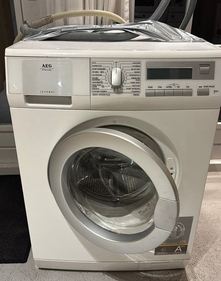 Wasmachine AEG (trommel maakt geluid), Witgoed en Apparatuur, Wasmachines, Ophalen, Zo goed als nieuw, 1200 tot 1600 toeren, 85 tot 90 cm