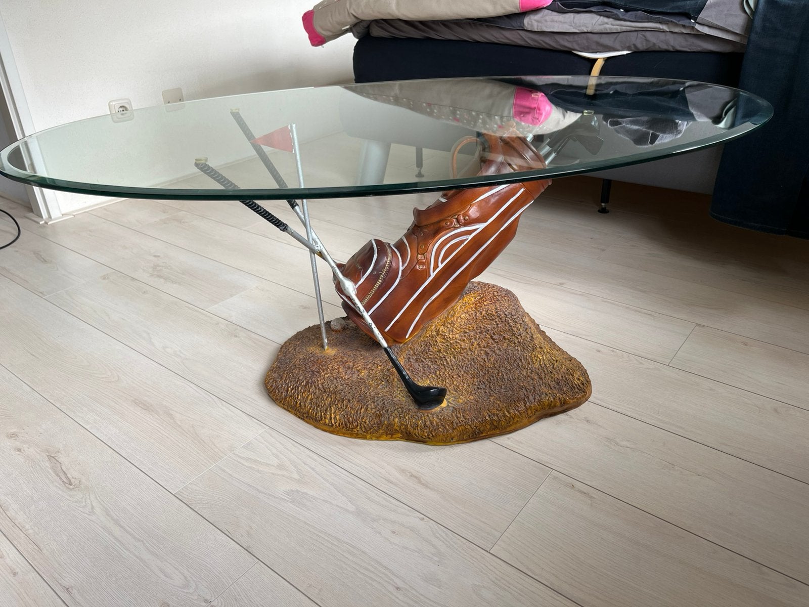 Ovale glazen salontafel voor golfers, Huis en Inrichting, Tafels | Salontafels, Ophalen, Gebruikt, 100 tot 150 cm, 50 tot 100 cm