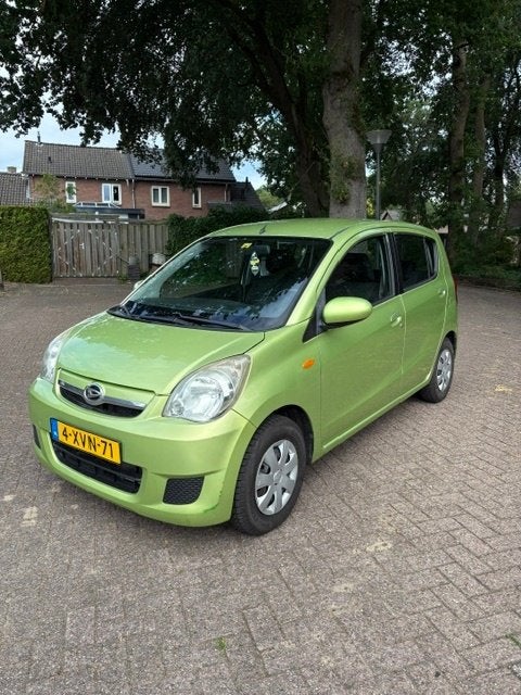 Daihatsu Cuore 1.0 5D 2011 Groen, Auto's, Daihatsu, Voorwielaandrijving, Stof, 600 kg, 18 €/maand