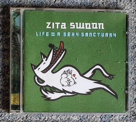 CD Zita Swoon - Life = a sexy sanctuary, Ophalen, Inclusief boekje, Gebruikt, Pop