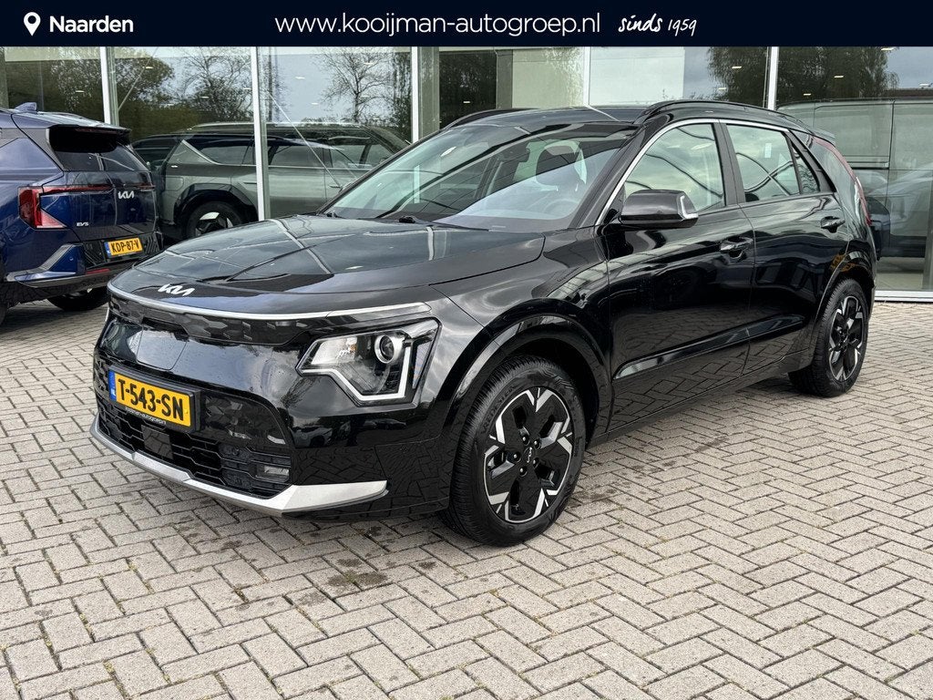 Kia Niro EV DynamicLine 64.8 kWh Nav|Camera|Lmv, Auto's, Gebruikt, 750 kg, 1657 kg, Leder en Stof