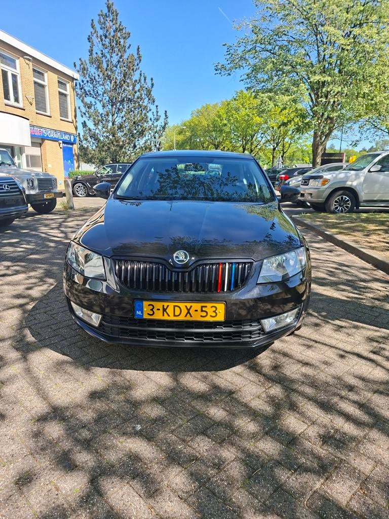 Skoda Octavia 1.2 TSI 77KW 2013 Zwart, Auto's, Voorwielaandrijving, Euro 5, Stof, 4 cilinders