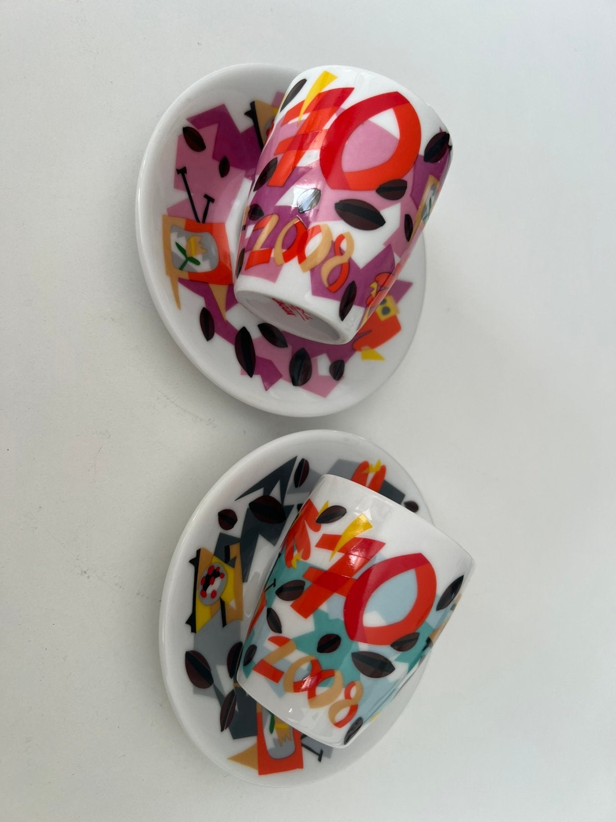 2 Koffiekopjes met schotels Gaggia 70e verjaardag, Huis en Inrichting, Keuken | Servies, Ophalen of Verzenden, Overige stijlen