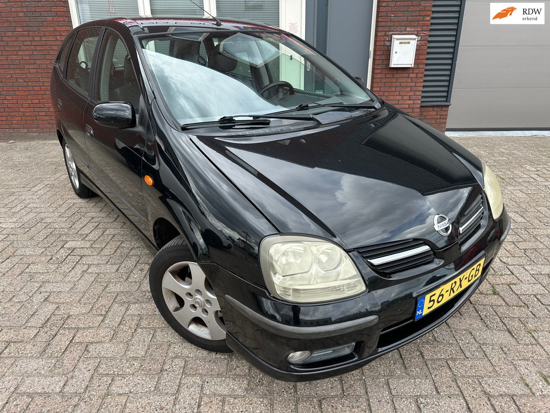 Nissan Almera Tino 1.8 Acenta / Navi / Camera / Leder / Airc, Auto's, Nissan, 4 cilinders, Met garantie (alle), Almera Tino, Zwart