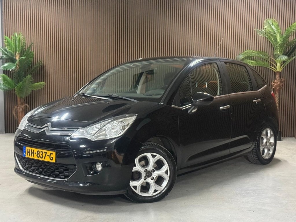 Citroën C3 1.2 PureT Exclusive (bj 2014), Auto's, Voorwielaandrijving, Stof, Gebruikt, 1199 cc