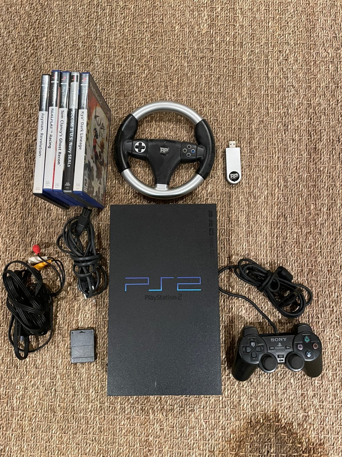 Werkende playstation 2 met memory kaart, games en race stuur, Spelcomputers en Games, Spelcomputers | Sony PlayStation 2, Zwart
