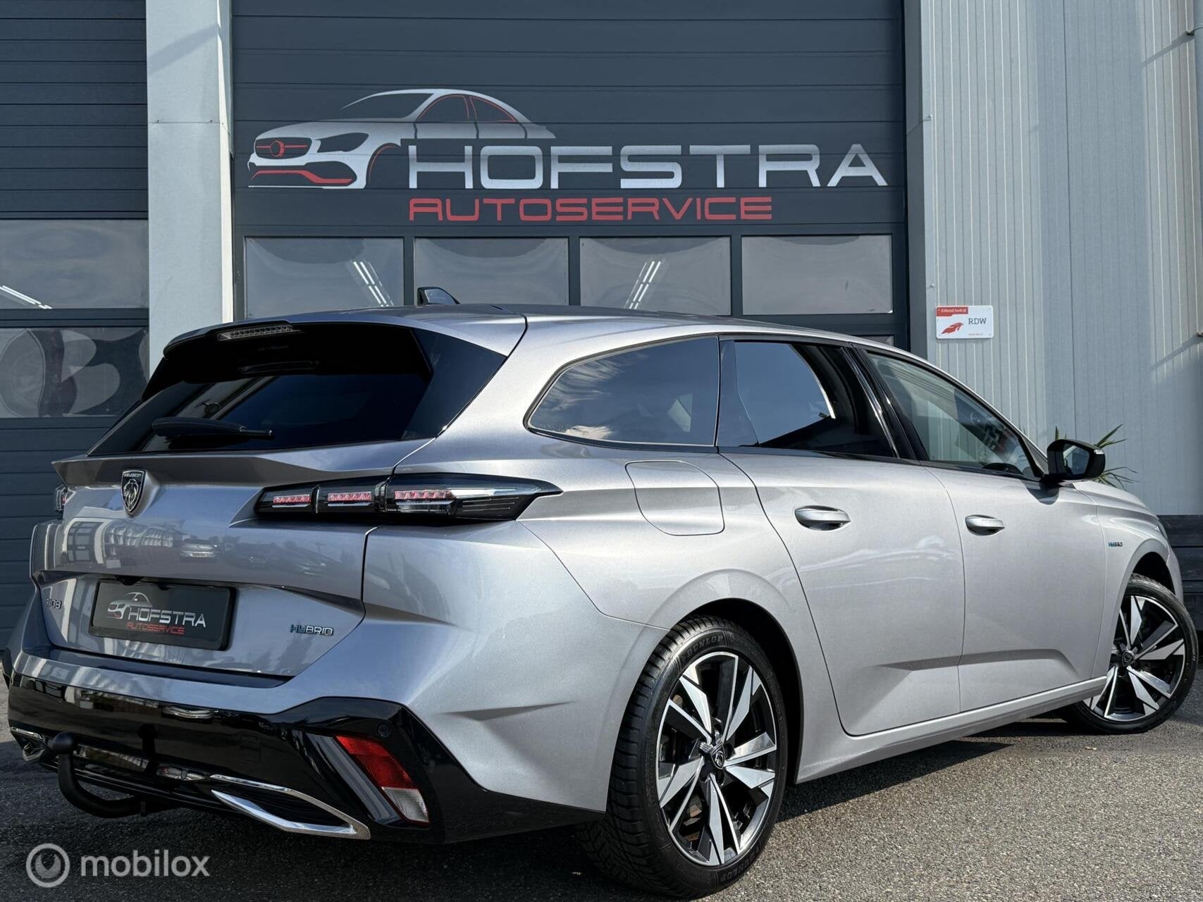 Peugeot 308 SW 1.6 HYbrid 180 Allure Pack Camera Trekhk Luxe, Auto's, Gebruikt, 4 cilinders, 181 pk, Automatische klimaatregeling