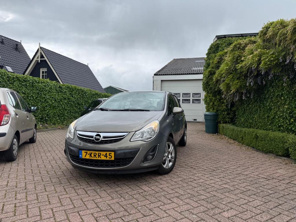 Opel Corsa 1.2 16V 5D 2013  Airco Cruise control, Auto's, Opel, Voorwielaandrijving, 1063 kg, 4 cilinders, Bruin