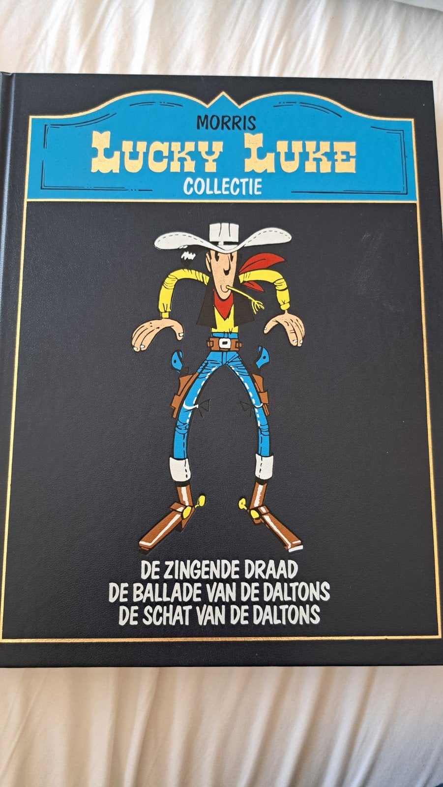 Lucky Luke Collectie nr6 - De Zingende Draad, Eén stripboek, Ophalen of Verzenden, Zo goed als nieuw, Morris