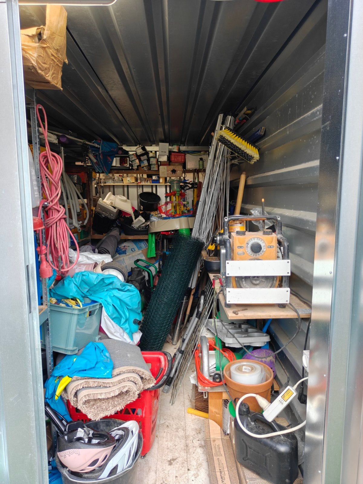 Opslagcontainer 2x4 met overkapping en opslagrekken, Ophalen