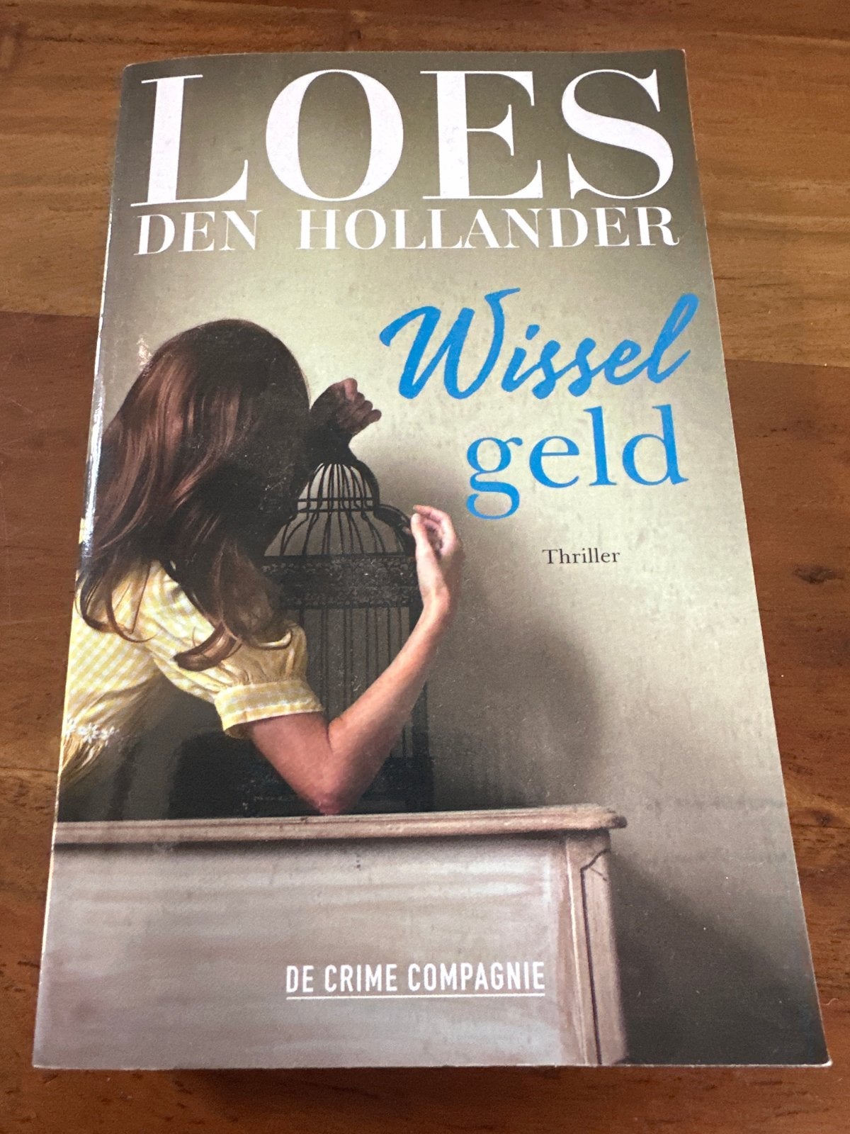 Wisselgeld - Loes den Hollander (Thriller), Boeken, Ophalen of Verzenden, Zo goed als nieuw, Nederland