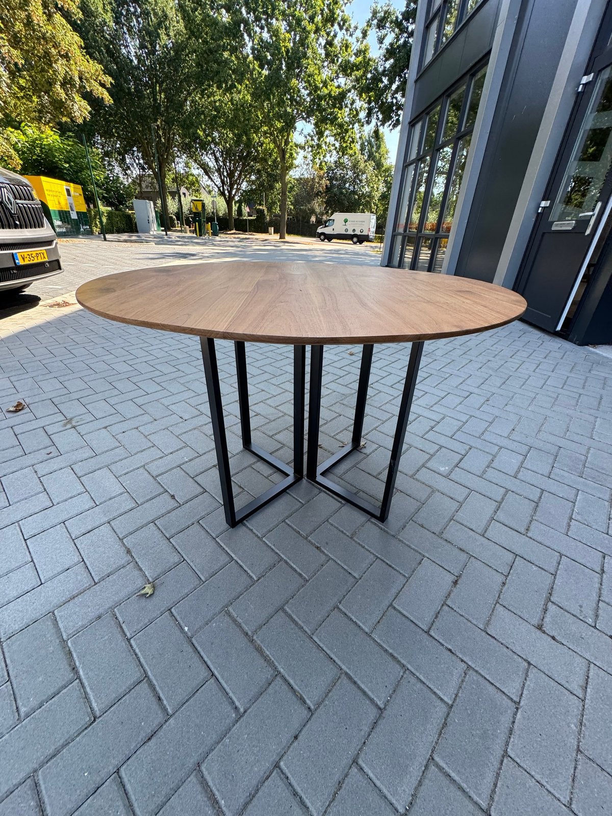 Ronde eettafel met houten blad en metalen onderstel, 100 tot 150 cm, Rond, Ophalen of Verzenden, Zo goed als nieuw