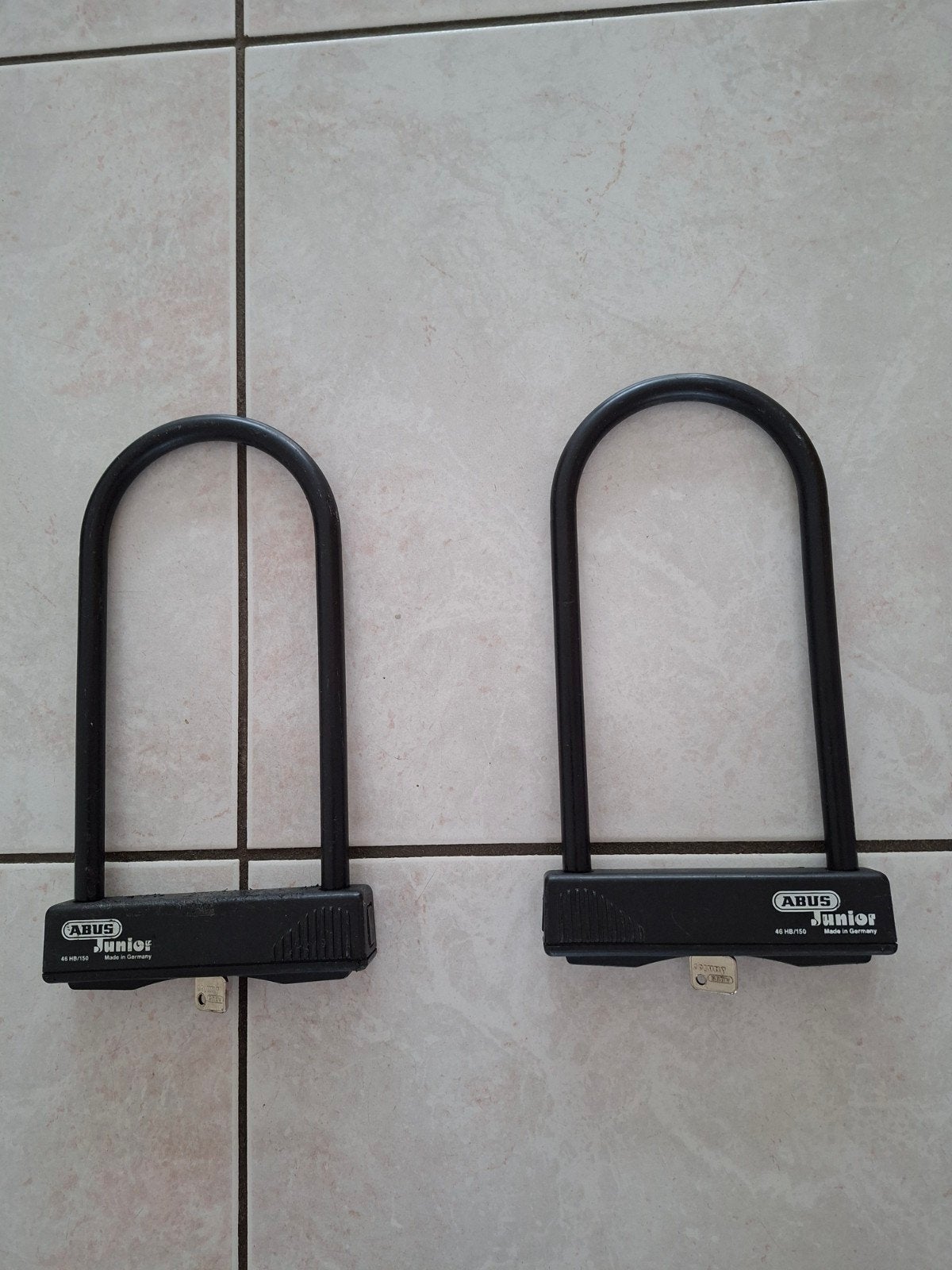 Twee abus sloten, Ophalen, Kettingslot