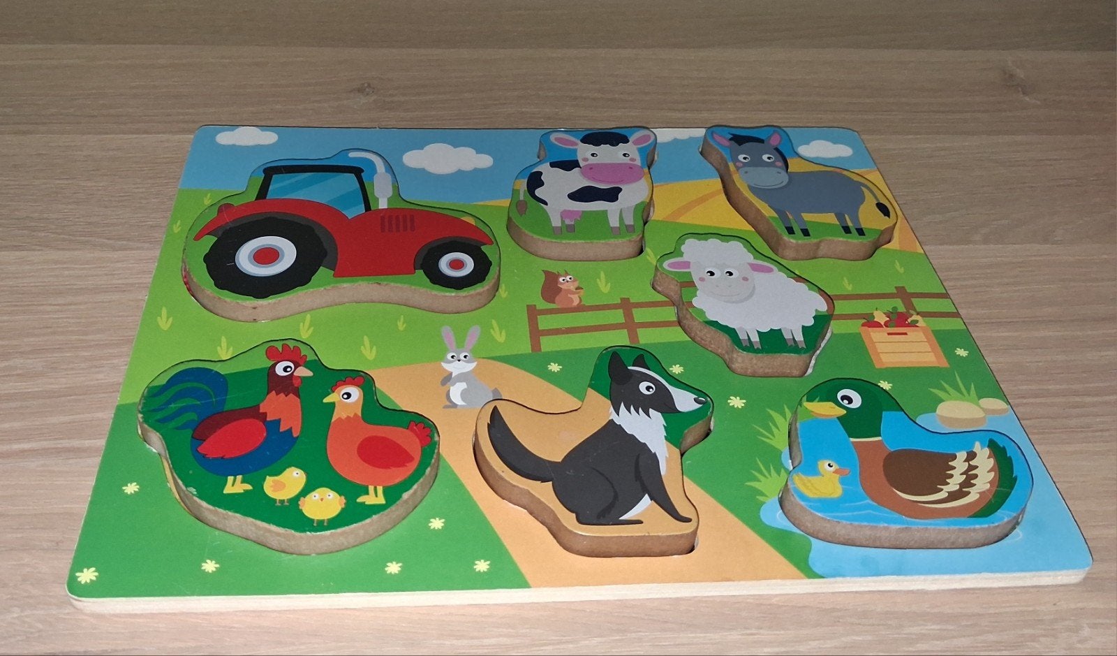 Sensorische houten boerderij puzzel met dieren en tractor, Ophalen of Verzenden, Gebruikt, Puzzelen