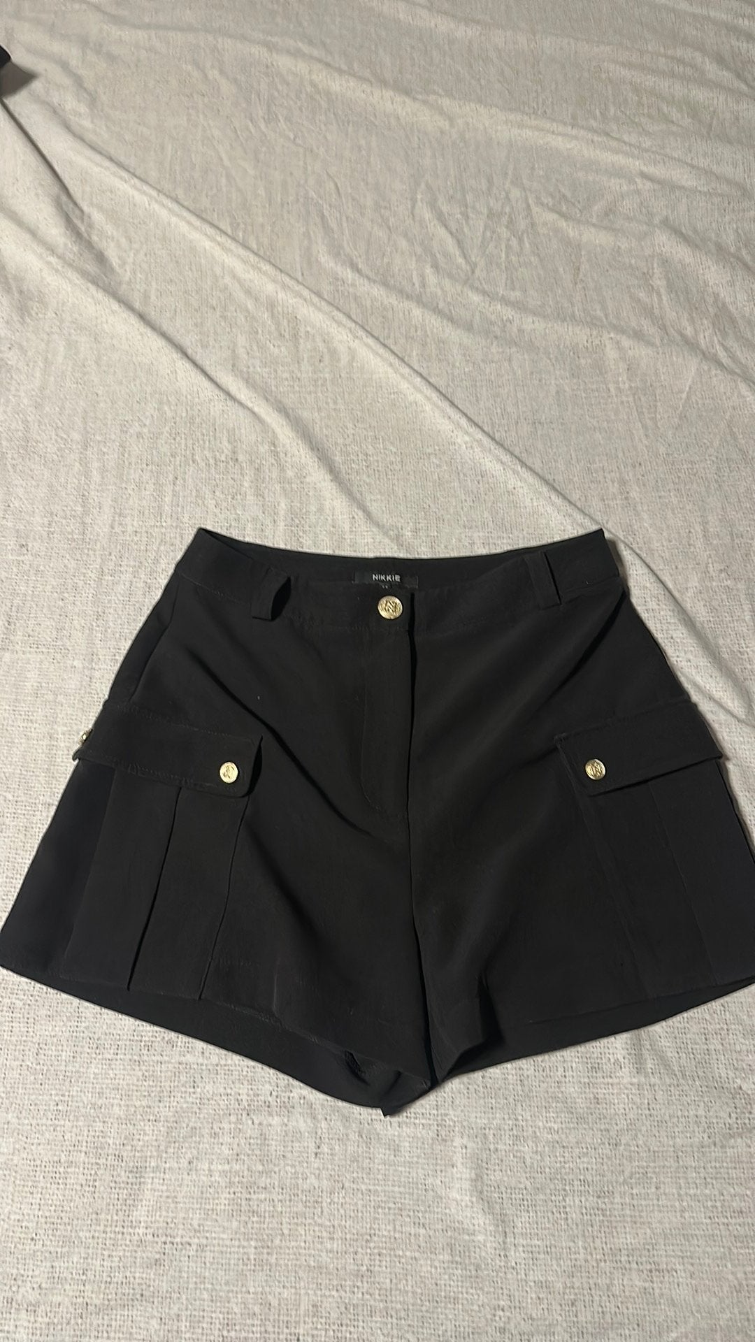 Gezocht! Nikkie dhaka short maat 34, Ophalen, Kort, Zwart, Zo goed als nieuw