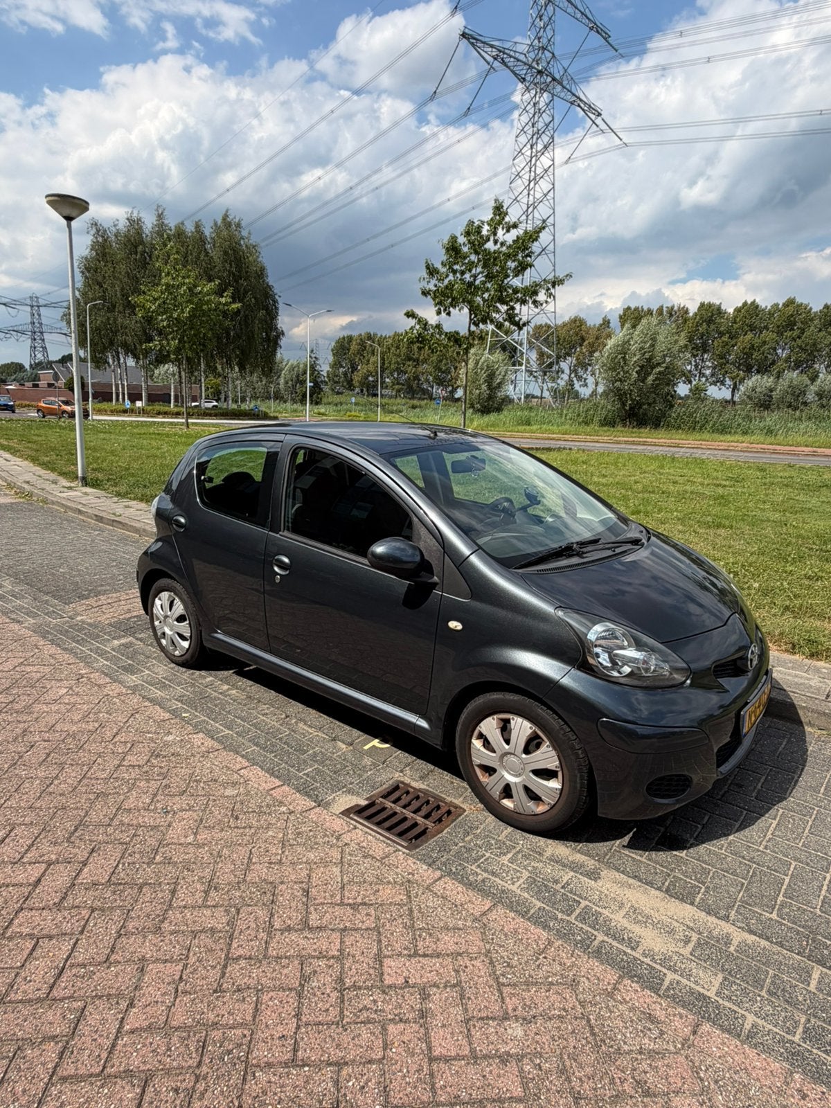 Toyota Aygo 1.0 12V Vvt-i 5DRS 2009 Grijs, Auto's, Voorwielaandrijving, 4 stoelen, 68 pk, Handgeschakeld