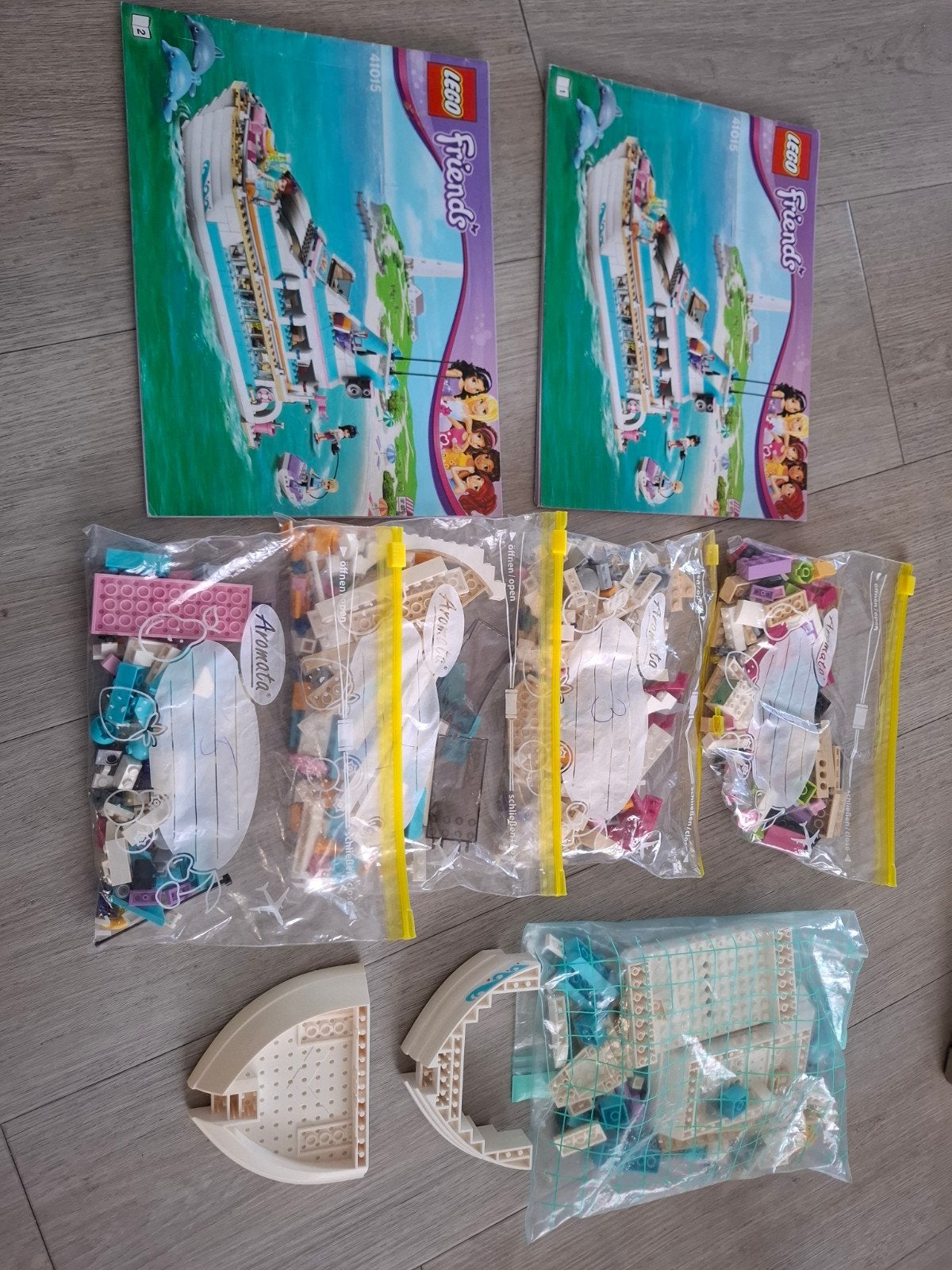 Lego Friends Dolfijn Cruiser 41015 met boekjes, Ophalen of Verzenden, Gebruikt, Overige merken