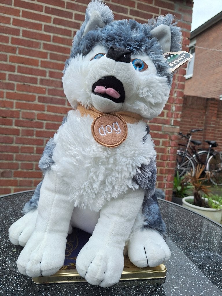 Aangeboden : pluche speelgoedhond