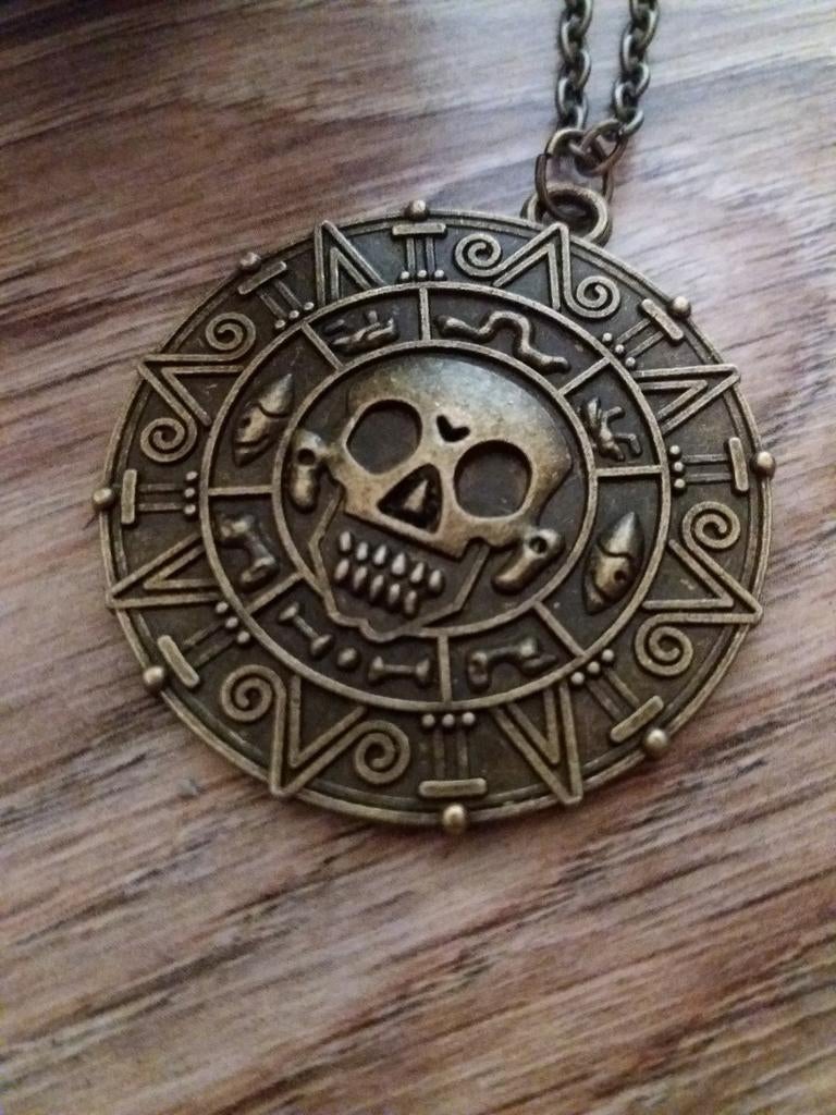 NIEUW Disney Pirates of the Caribbean ketting PARTIJVERKOOP!, Ophalen of Verzenden, Nieuw, Goud, Overige materialen