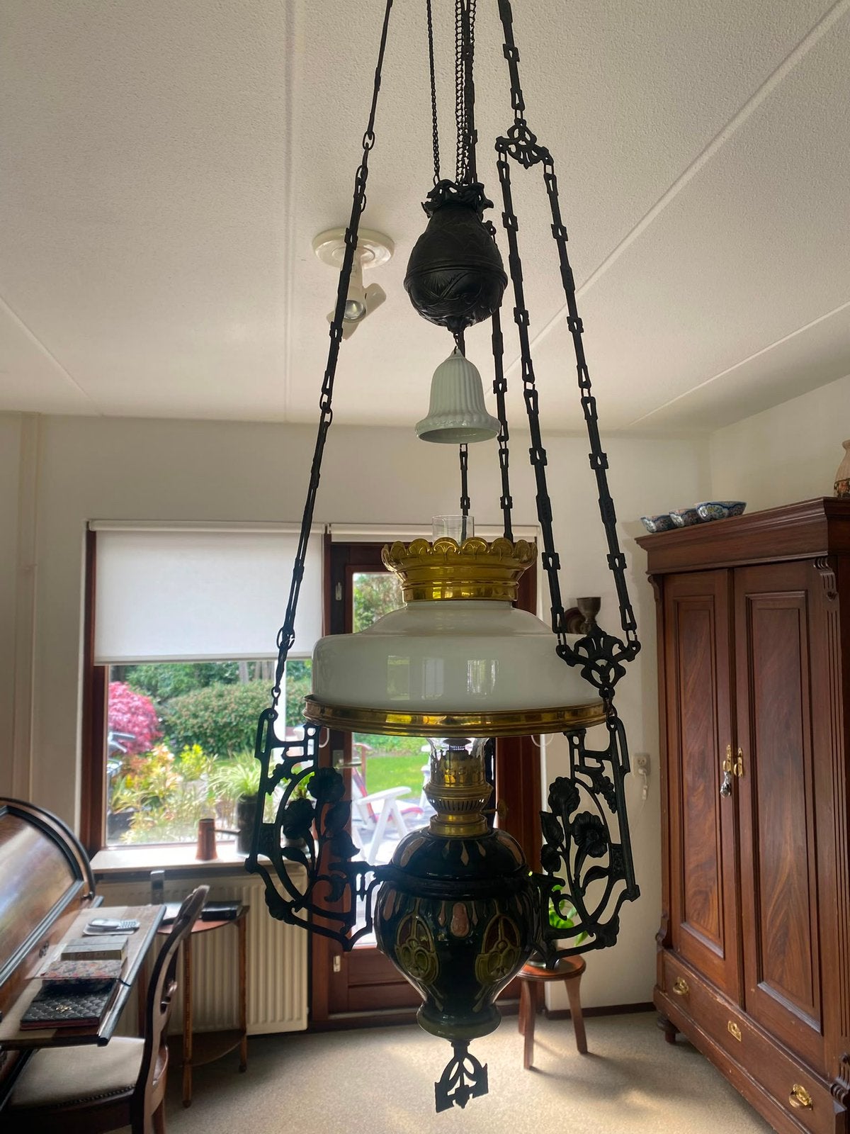 Antieke pertolium lamp, Ophalen