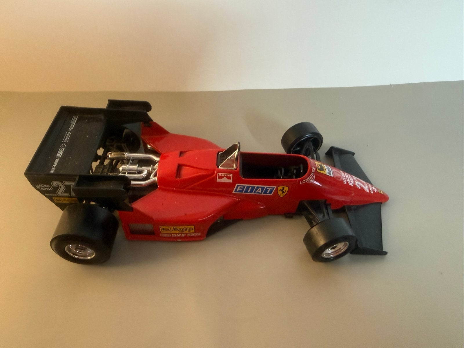 Bburago Ferrari 126 C4 F1 (1984) - Michele Alboreto #27, Ophalen of Verzenden, Gebruikt, Auto, Bburago