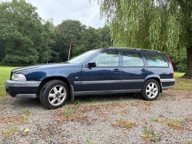 Volvo V70 2.5 XC 4WD AUT 1999 Blauw (meer loop dan sloop), Auto's, Automaat, Beige, Blauw, Stationwagon