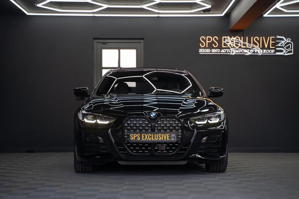 BMW 4 Serie Coupé M440i xDrive High Executive / Adaptive /, Auto's, BMW, Automaat, 4 stoelen, Zwart, Bedrijf