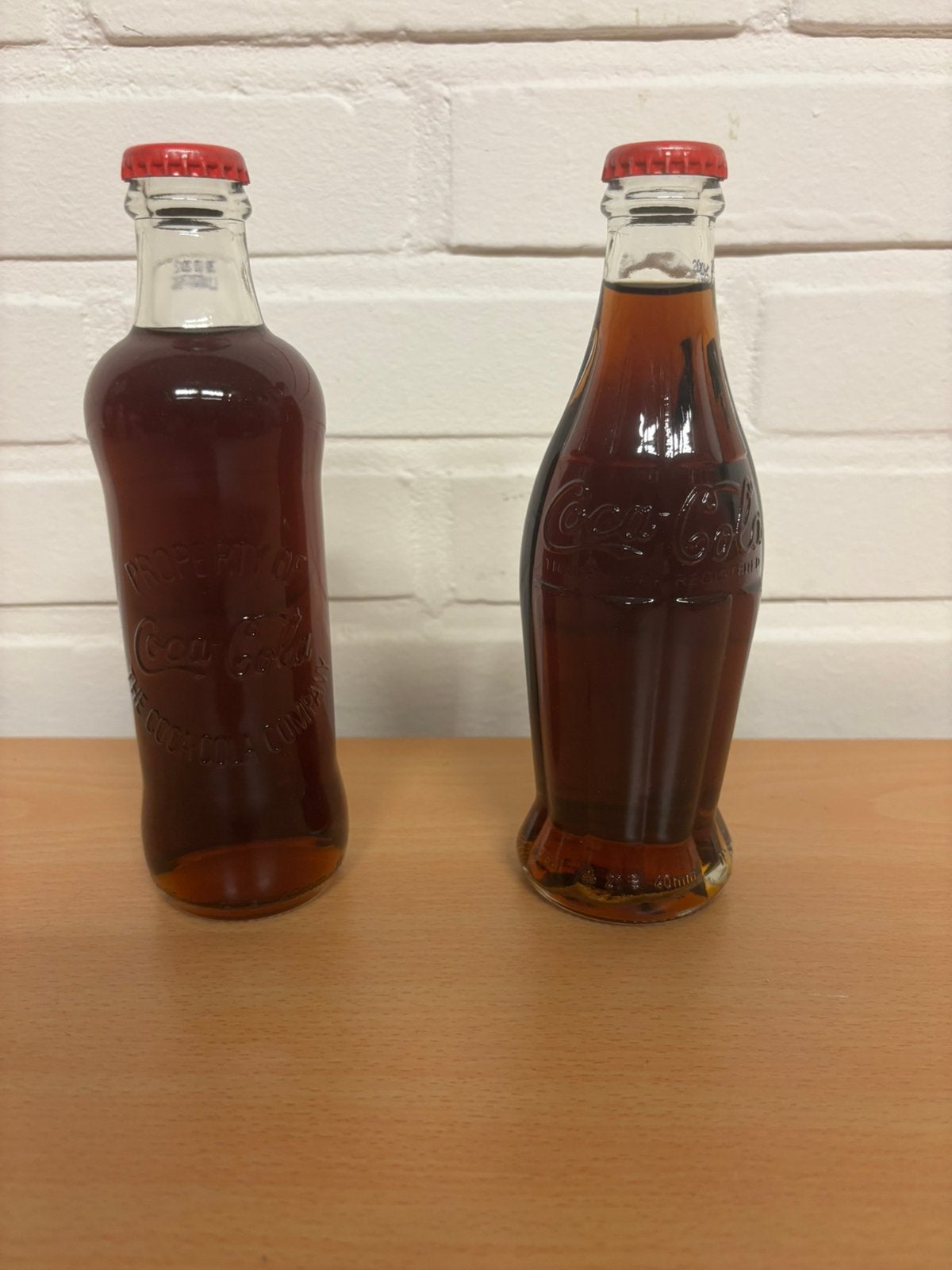 2 Volle coca cola flessen., Verzamelen, Ophalen of Verzenden